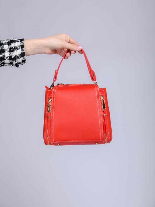 Red bag with a narrow strap