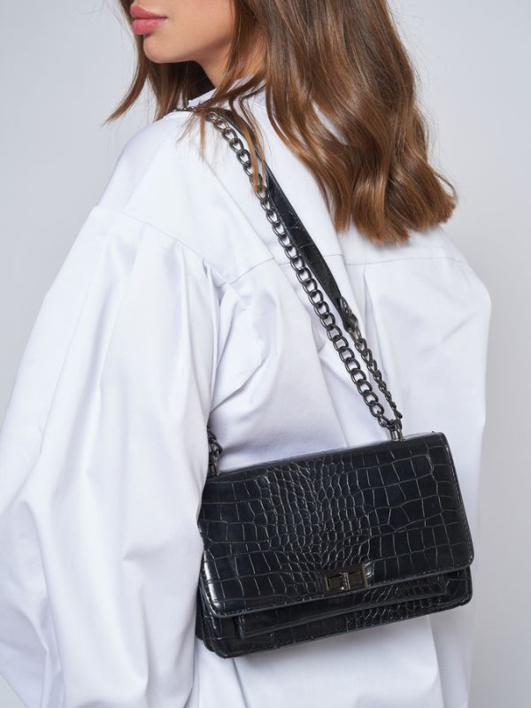 Black bag with crocodile embossing